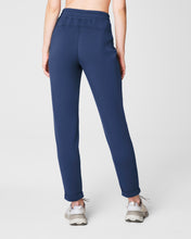 Load image into Gallery viewer, Spanx AirEssentials Tapered Pant - Faded Indigo